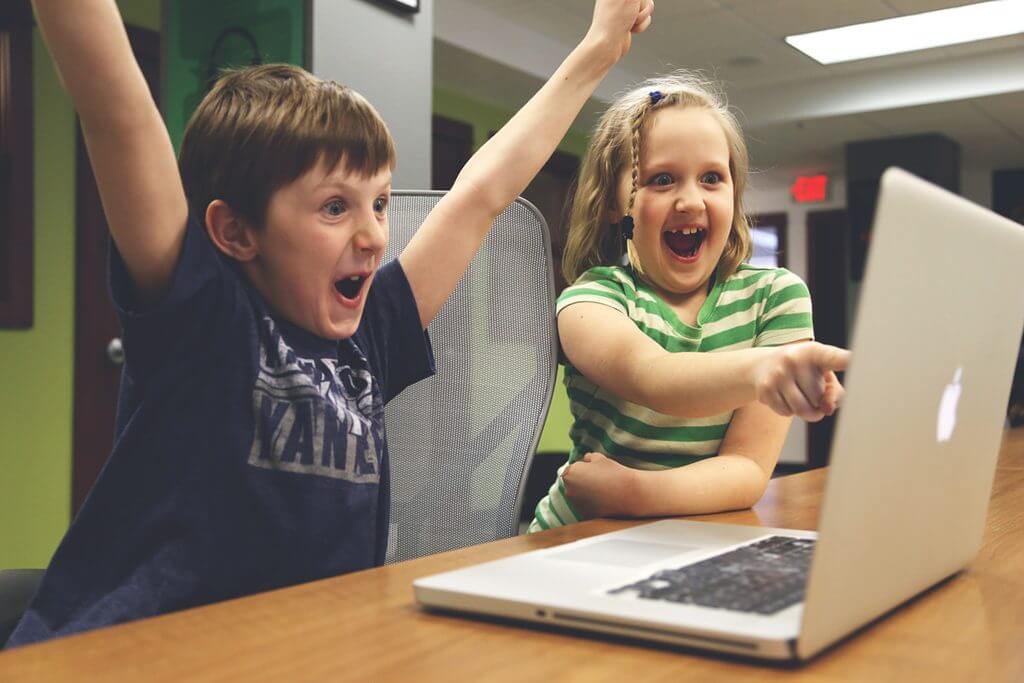 Children playing language learning games